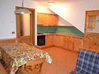 Residence cimbro mezzaselva cucina soggiorno