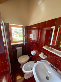 Bathroom with a view of the territory of Cesuna