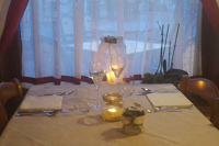 Tavolo e atmosfera cena alla locanda