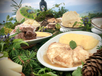 Typical dishes of Malga with mountain cheeses