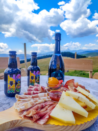 Cutting board with agricultural beer and prosecco