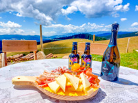 Cutting board with agricultural beer and prosecco