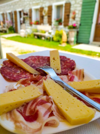 Plate of cheeses and cold cuts of malga