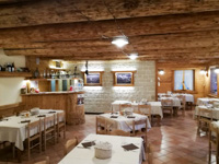 The welcoming room of the Agriturismo Malga Spill