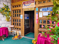 Exterior with autumn decorations and flowers