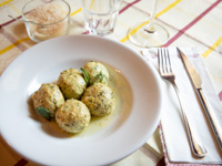 Dumplings with ricotta and herbs sautéed with butter and sage