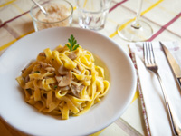 Homemade tagliatelle with porcini mushrooms