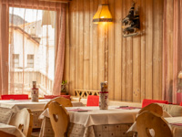 The welcoming dining room of the Locanda Stella