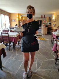 Cute waitress at the Campolongo Refuge restaurant