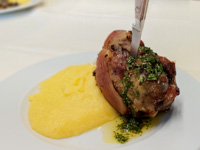 Baked pork shank with polenta