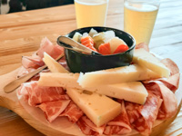Mixed platter of cheeses and cured meats