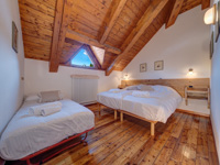 Room overlooking the terrace of the Malga Campomulo Refuge