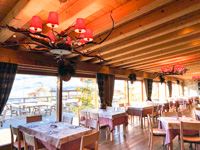 Dining room overlooking the snowy exterior