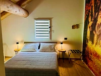The double bed in the Autumn room