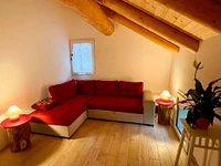 The comfortable sofa in the common area for relaxation