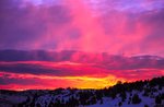 Snowshoeing at sunset with dinner at the Alpine hut Bar