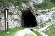 Cave entrance with rail car Portule Nozzle