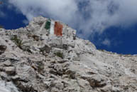 Italian flag on Ortigara on rock