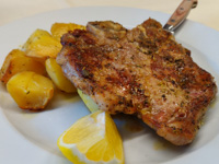 Braciola con patate al forno