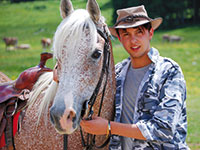 Cavallo e cavaliere al rifugio campolongo